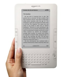 Hand holding a kindle.