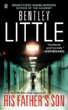 Man walking down dirty hospital hallway.