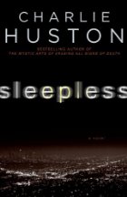 A city in sepia tones with the title of the book in fuzzy white letters over the black sky.