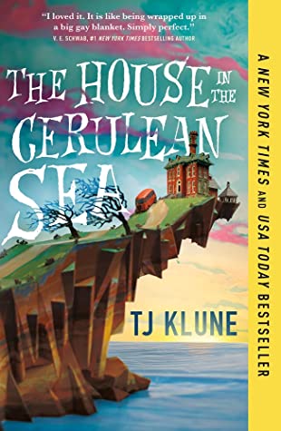 Digital image of the cover for The House in the Cerulean Sea. A cartoon drawing of a Victorian style home on a cliff over the ocean with two trees blowing in the breeze. A yellow bar on the side advertises that this is a New York Times and USA Today bestseller.