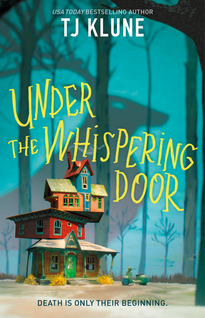 Image of a digital book cover. A four story home built like jenga stands in front of a woods where a shadow of a deer with antlers can be seen. The title of the book is in yellow font.